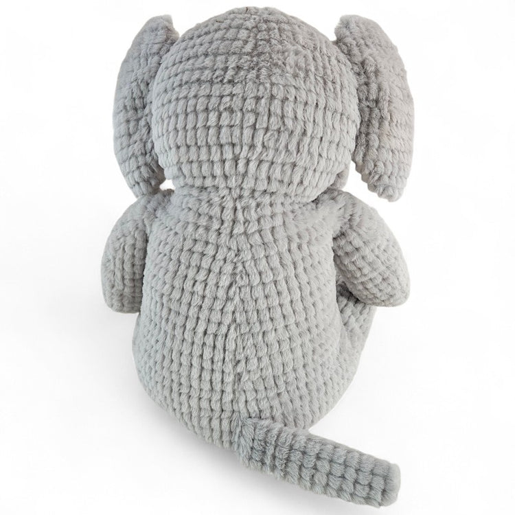 Gray textured plush elephant toy on a white background
