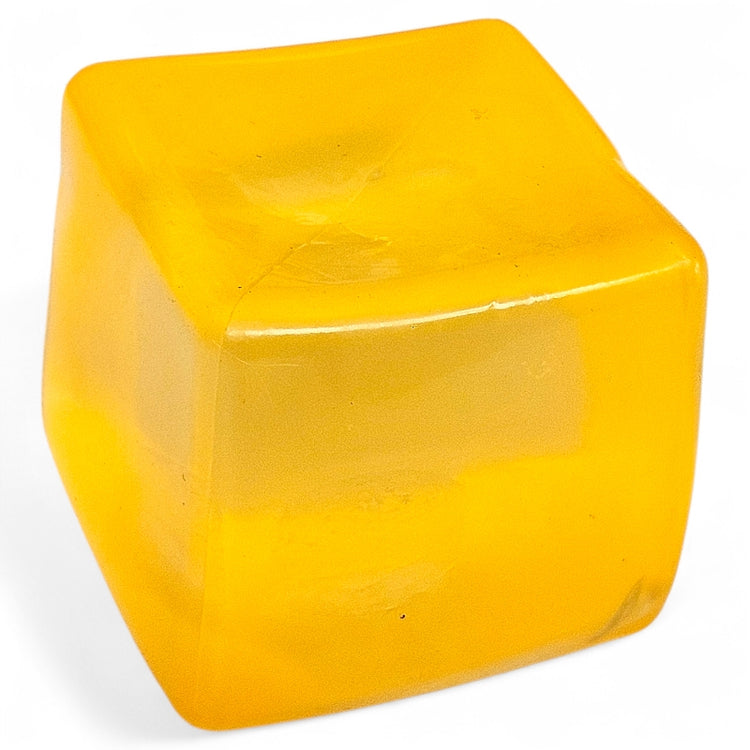Yellow cube on a white background