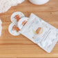 Moonlight Sleep Stickers packaging with stickers on a wooden surface