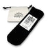 A two-pack of black bamboo seamless socks for kids, presented in a white drawstring bag with the logo &