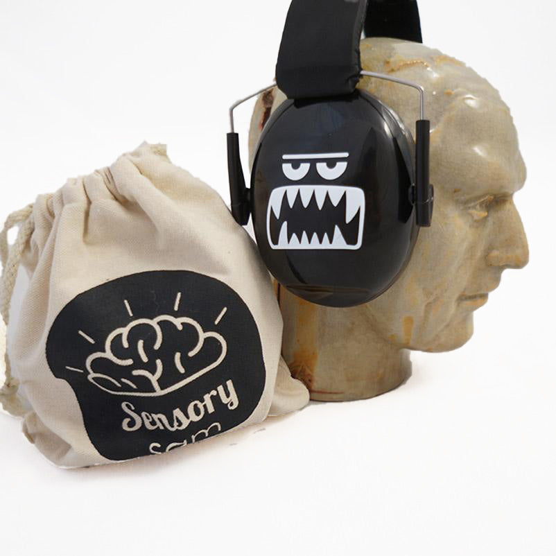 Black monster ear defenders from the Brightspark kit shown on a mannequin with storage bag