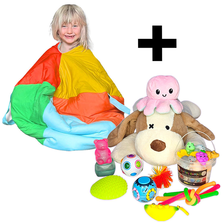 Child sitting on a colorful bean bag with toys and a plush octopus toy on a white background