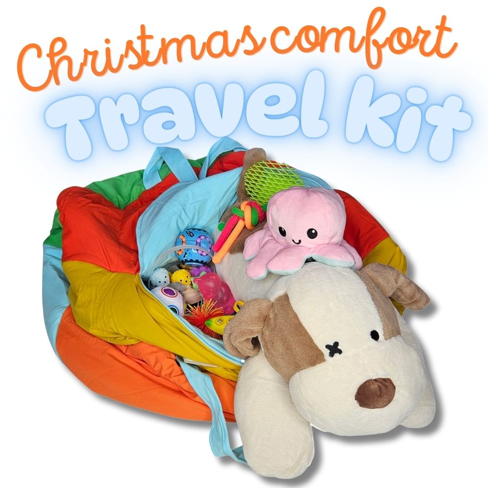 Colorful travel kit with plush toys and items on a white background