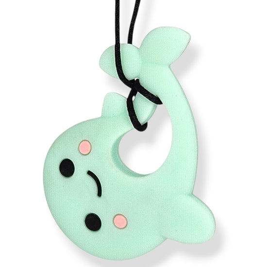 Mint green character with a sad expression on a white background