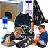 Collage of children playing with various toys and products, including a cardboard box, water bottles, and a drawstring bag.