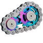 A multicolored stainless steel gear chain fidget toy.