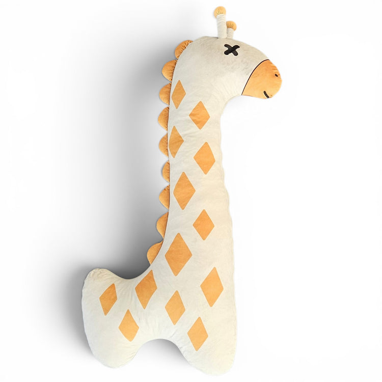 Plush giraffe toy with a white body and orange spots on a white background