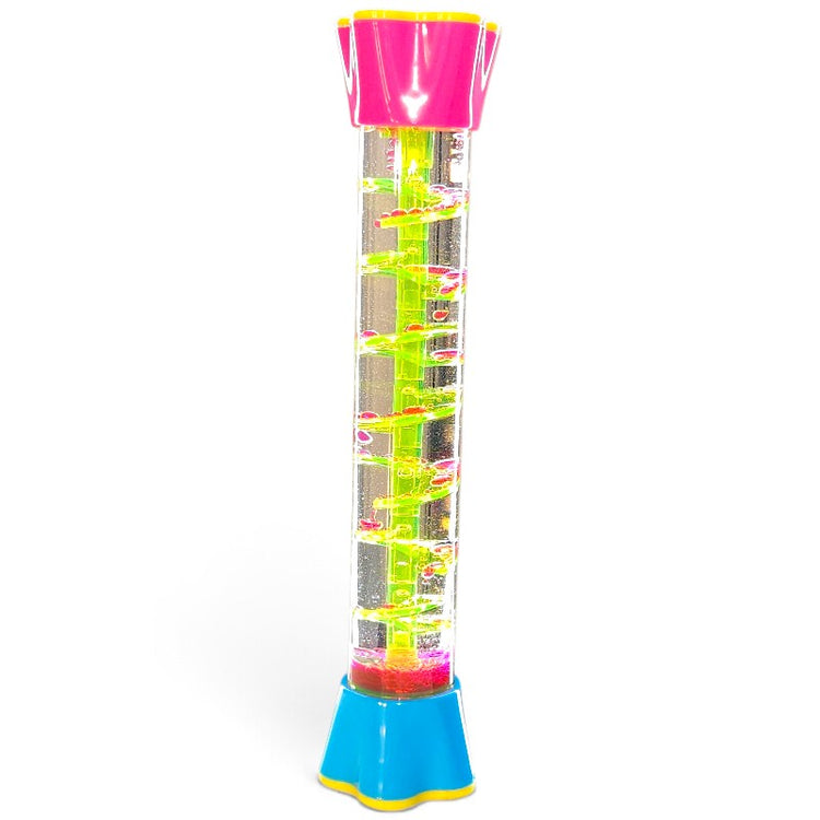 Clear glitter fountain spiral tube with a green internal spiral, pink top and blue base.