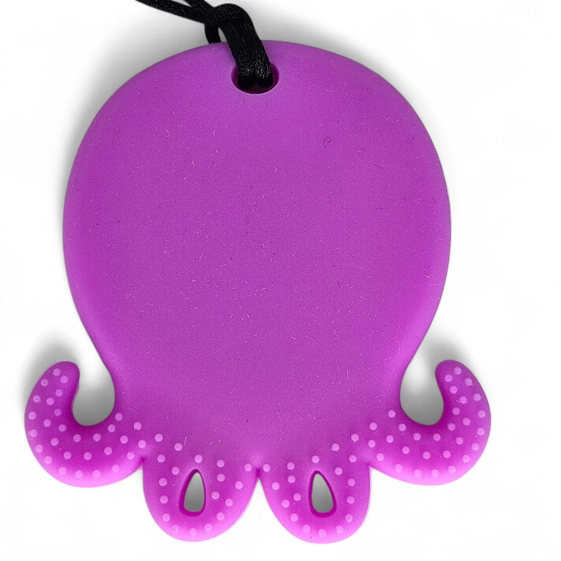 Purple octopus-shaped teething toy with a black string on a white background