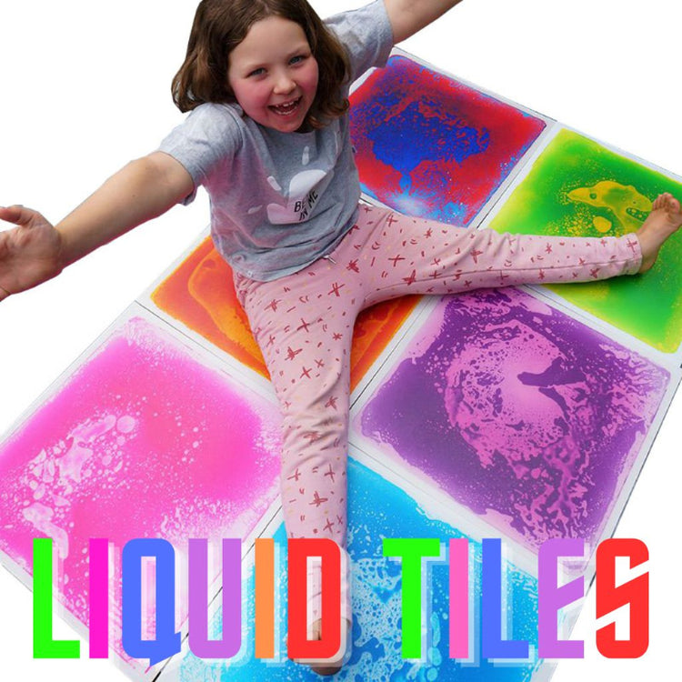 A child sitting on colorful liquid sensory tiles with text &