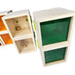 Set of wooden boxes with colorful interior and lids on a white background