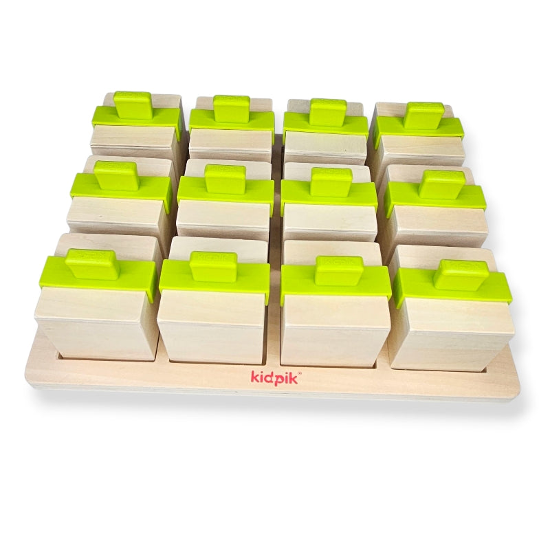 Wooden building blocks with green pieces on a white background, brand &