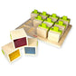 Wooden block sorting toy with colorful blocks on a white background