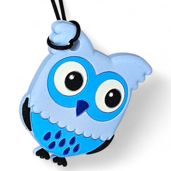 Blue owl-shaped keychain on a white background