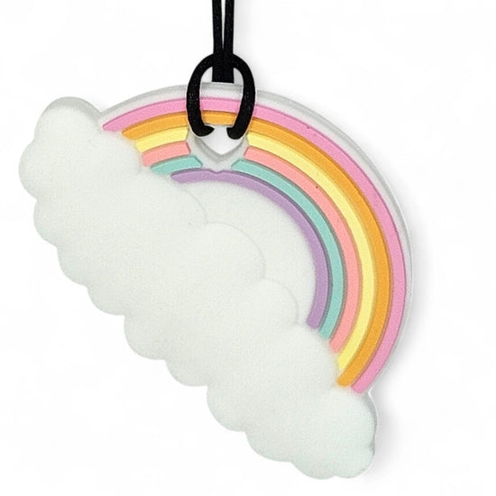 Colorful rainbow-shaped object on a white background