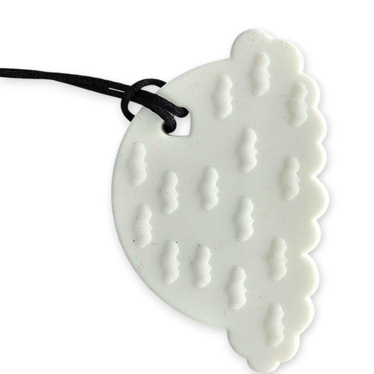 White ceramic leaf-shaped pendant on a black cord against a white background