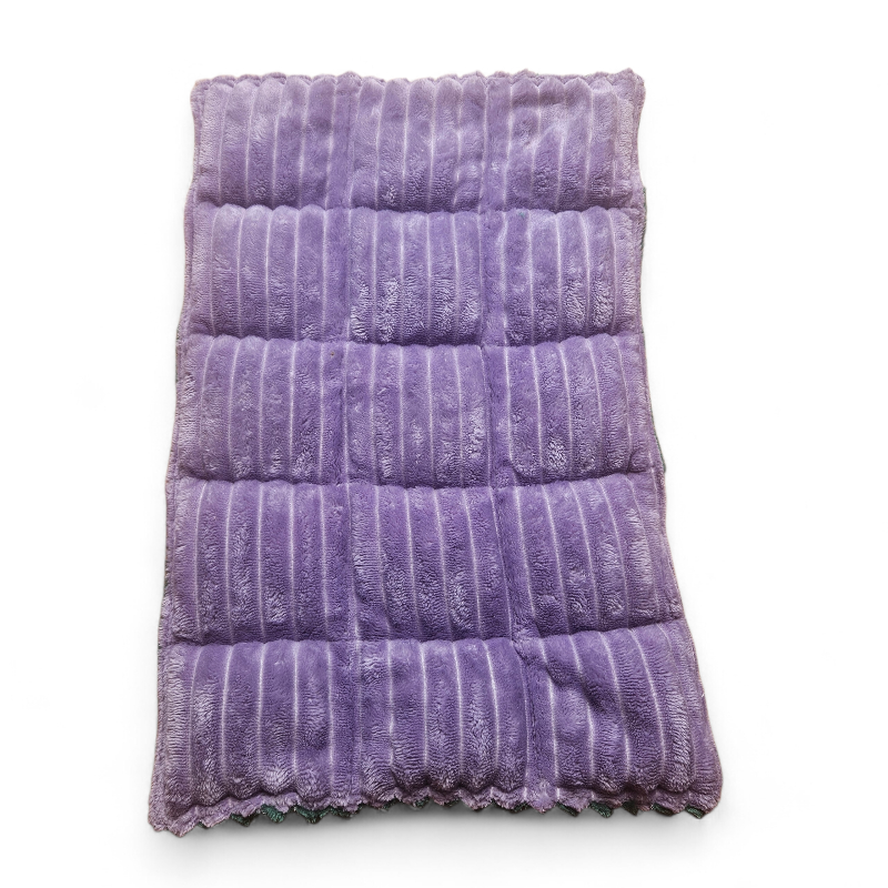 Purple textured blanket on a white background