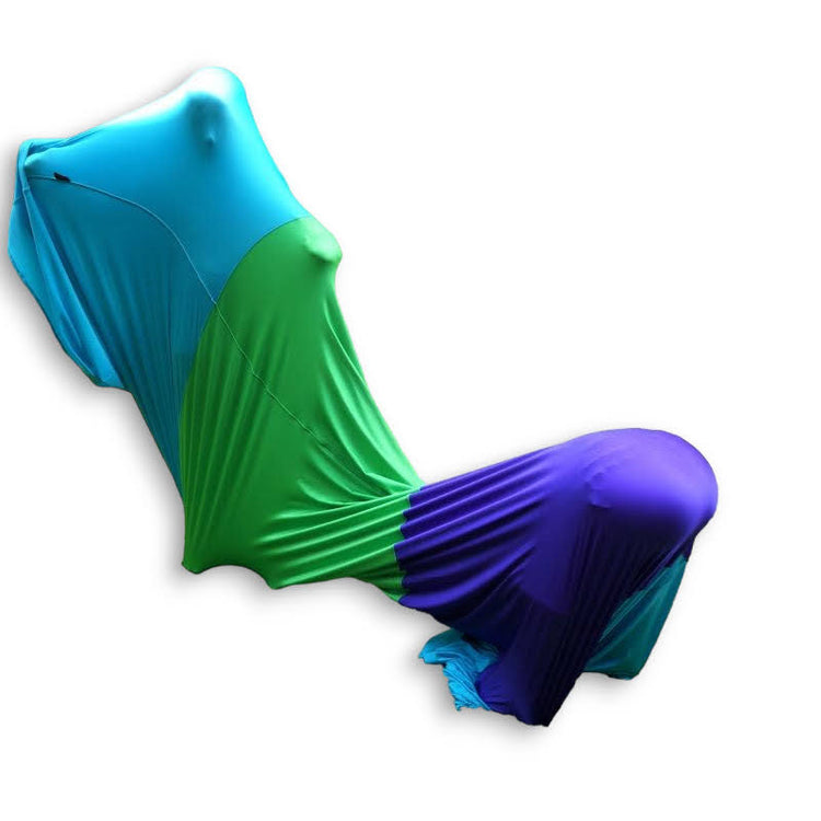 A multicolored Lycra Snake Tunnel with sections in blue, green, and purple, designed for sensory play and therapy.