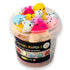 A clear plastic tub filled with various colorful squishy animal toys, with a label on the front displaying &