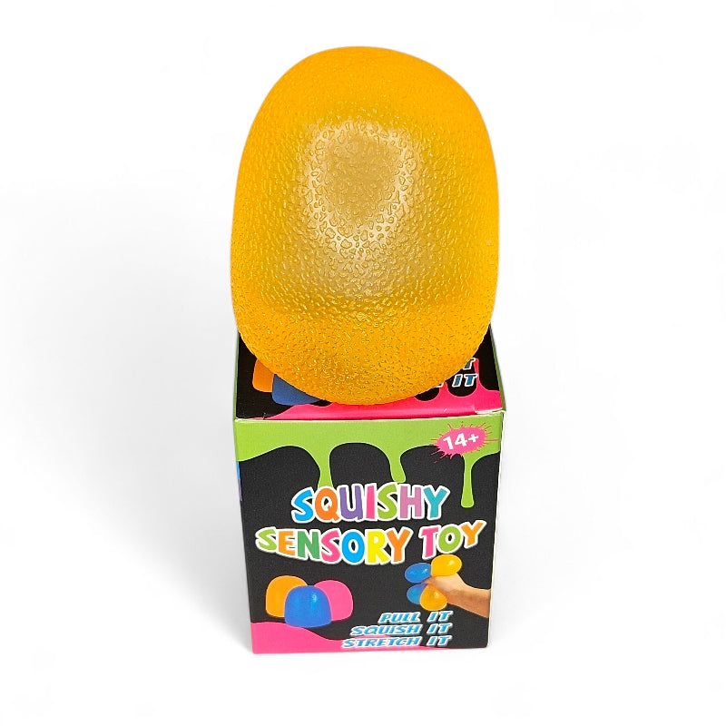 Yellow squishy sensory toy in packaging with colorful text on a white background