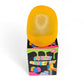 Yellow squishy sensory toy in packaging with colorful text on a white background