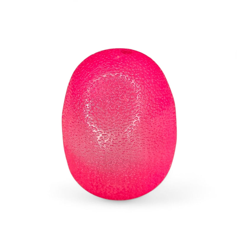 Pink massage ball with textured surface on a white background