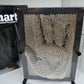 A 3-D Pin Art sculpture with moveable metal pins arranged in a 3D grid pattern, displaying a basic three-dimensional shape.