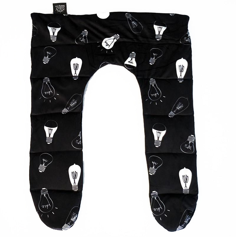 A black weighted shoulder hugger with a pattern of white light bulb designs, designed to be wrapped around the shoulders.