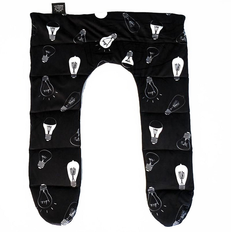 A black weighted shoulder hugger with a pattern of white light bulb designs, designed to be wrapped around the shoulders.