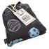 A black sensory bed sheet with space-themed prints, packaged with a label that reads &